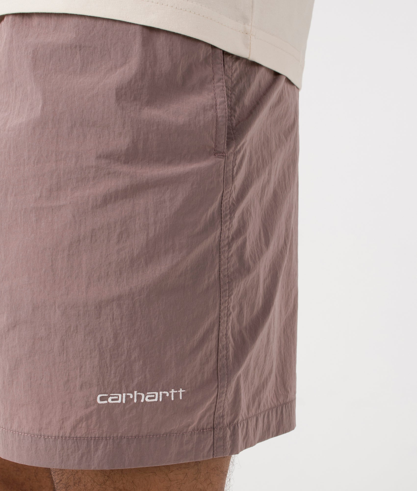 Tobes Swim Trunks in Glassy Pink by Carhartt WIP. EQVVS Detail Shot.