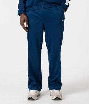 Relaxed Fit Benchill Joggers in Elder & Wax by Carhartt WIP. EQVVS Front Angle Shot.