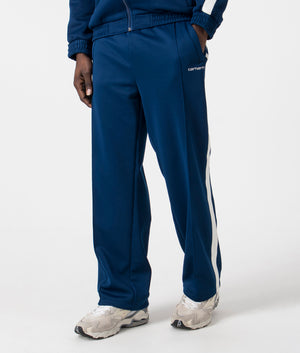 Relaxed Fit Benchill Joggers in Elder & Wax by Carhartt WIP. EQVVS Side Angle Shot.