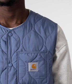 Carhartt WIP Quilted Skyton Vest in Bay Blue, 100% Recycled Polyester Detail Shot on Model at EQVVS