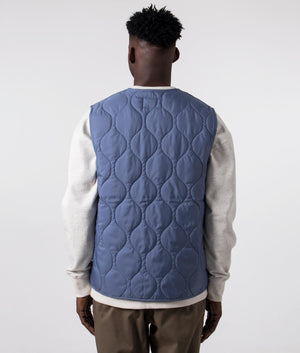 Carhartt WIP Quilted Skyton Vest in Bay Blue, 100% Recycled Polyester Back Shot on Model at EQVVS