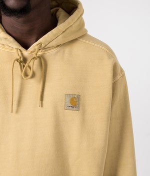Carhartt WIP Oversized Nelson Hoodie in Bourbon Yellow, 100% Cotton. Detail Model Shot at EQVVS