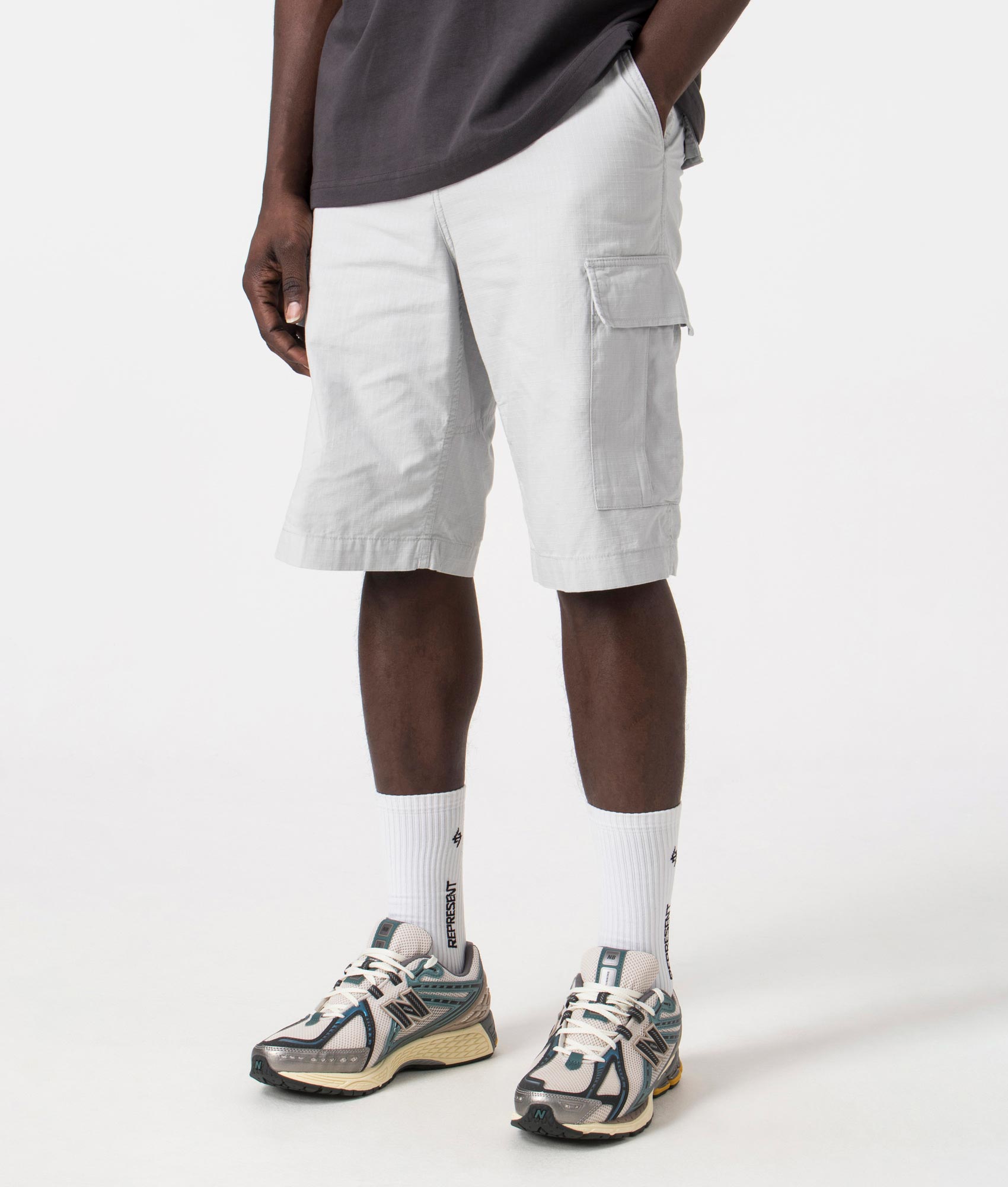 Carhartt WIP Regular Cargo Shorts in Sonic Silver, 100% Cotton Angle shot at EQVVS