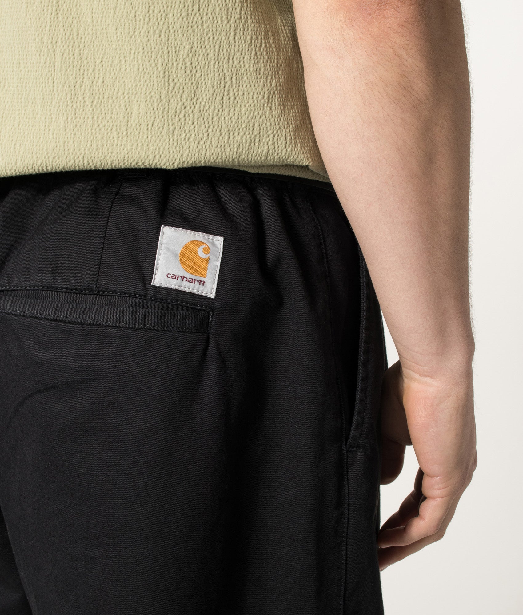 Carhartt WIP Marv Pants in Black Stone Washed at EQVVS Menswear. Detail shot.