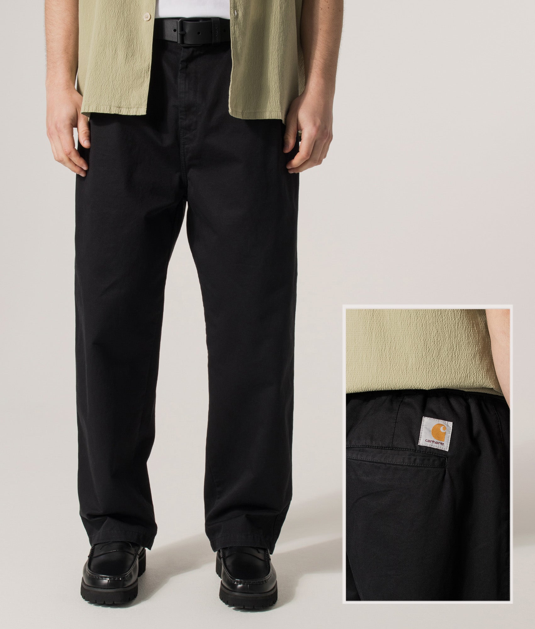 Carhartt WIP Marv Pants in Black Stone Washed at EQVVS Menswear. Front and back detail shot.