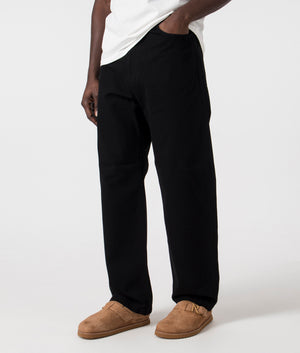 Relaxed Fit Landon Pants in Black by Carhartt WIP. EQVVS Side Angle Shot.