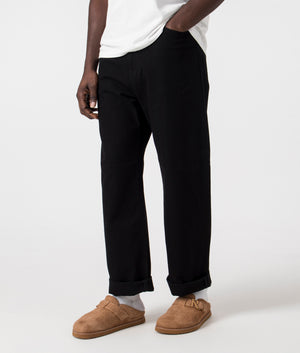 Relaxed Fit Landon Pants in Black by Carhartt WIP. EQVVS Side Angle Shot.