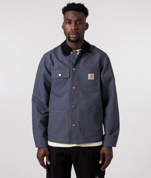 Carhartt WIP Michigan Coat in Zeus Blue and Black Rigid, 100% Organic Cotton Model Front Shot Buttoned Up at EQVVS