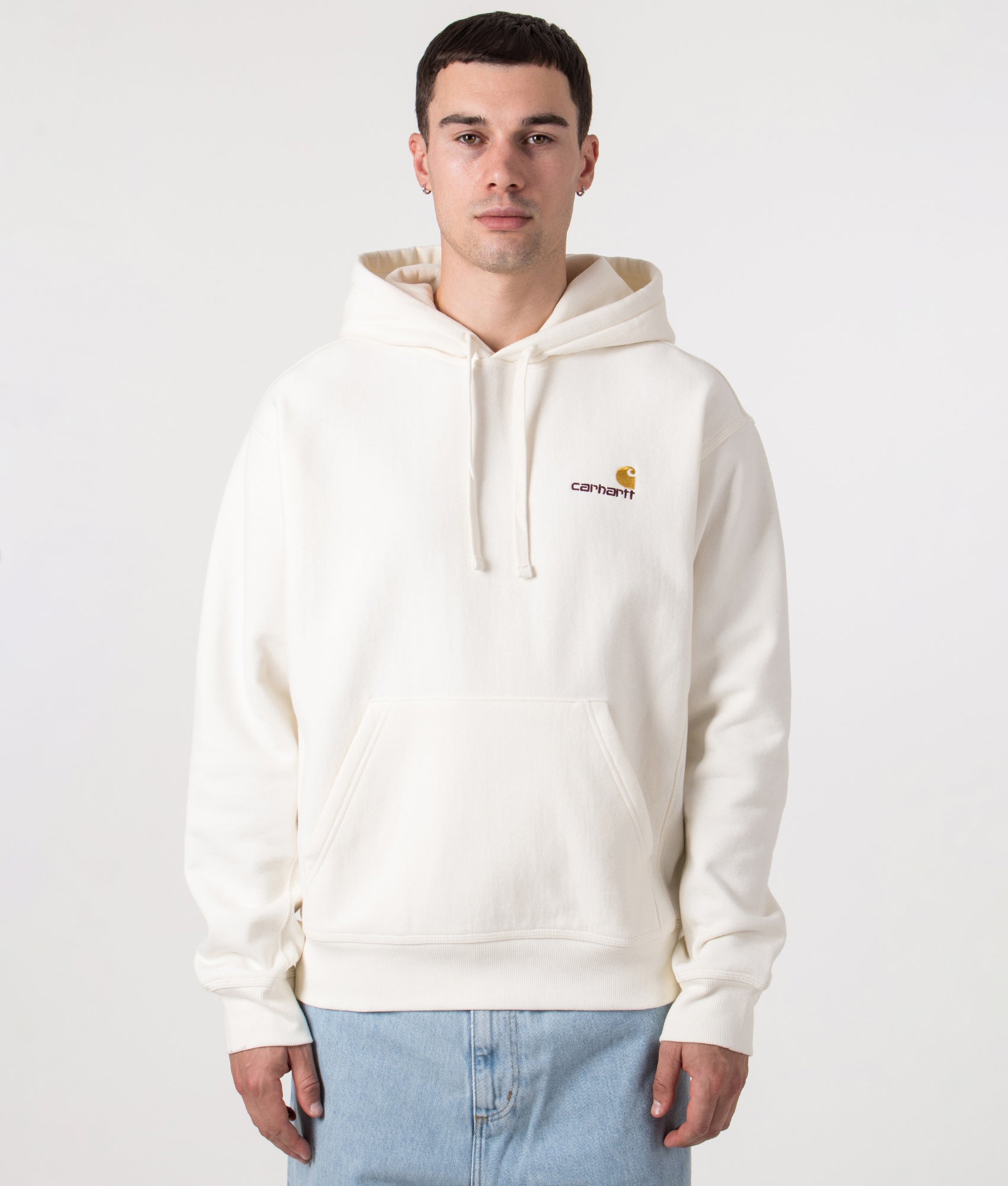 Relaxed Fit American Script Hoodie by Carhartt in Wax. Shot by EQVVS. Front model shot 