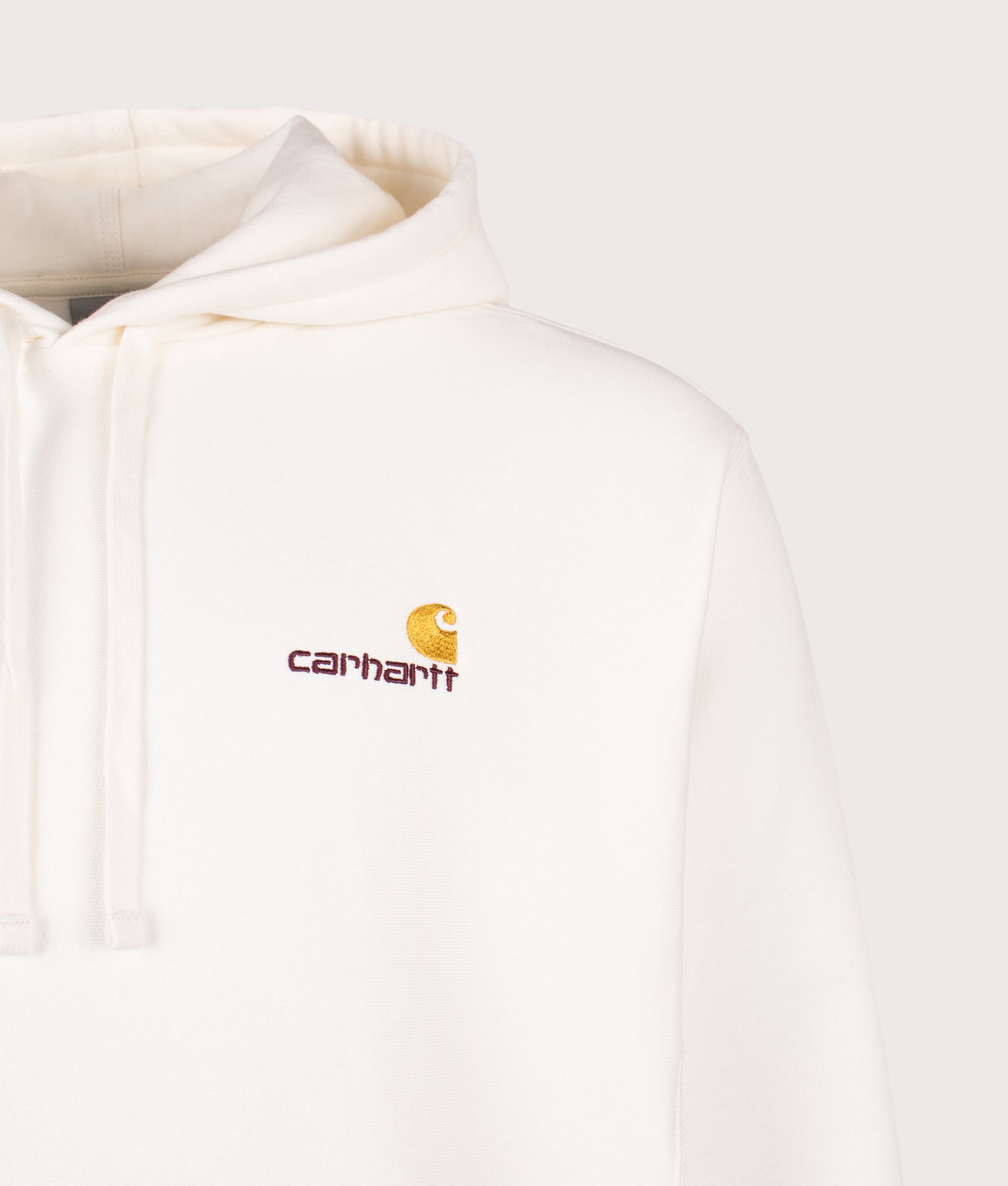 Relaxed Fit American Script Hoodie by Carhartt in Wax. Shot by EQVVS. Detail shot.