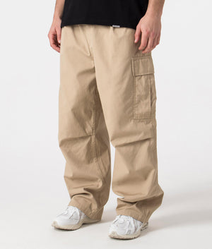 Carhartt WIP Relaxed Fit Cole Cargo Pant in Sable Beige Angle Shot EQVVS
