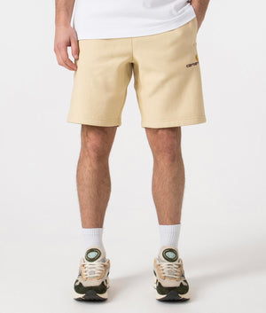 Carhartt WIP Relaxed Fit American Script Sweat Shorts in Rattan Yellow Front Shot at EQVVS