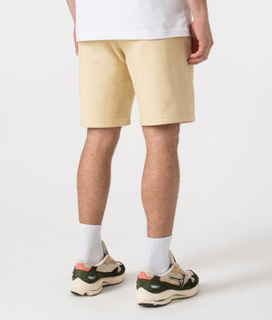 Carhartt WIP Relaxed Fit American Script Sweat Shorts in Rattan Yellow Back Shot at EQVVS