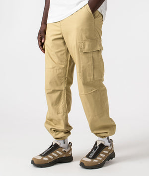 Carhartt WIP Regular Fit Cargo Pants in Agate Beige, 100% Cotton Angle Shot at EQVVS