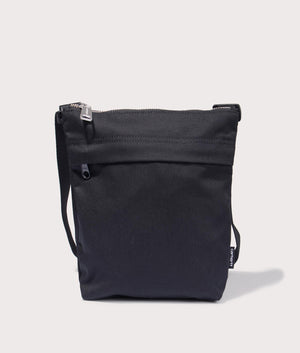 Carhartt Newhaven Shoulder Bag in Black. Front angle shot at EQVVS.