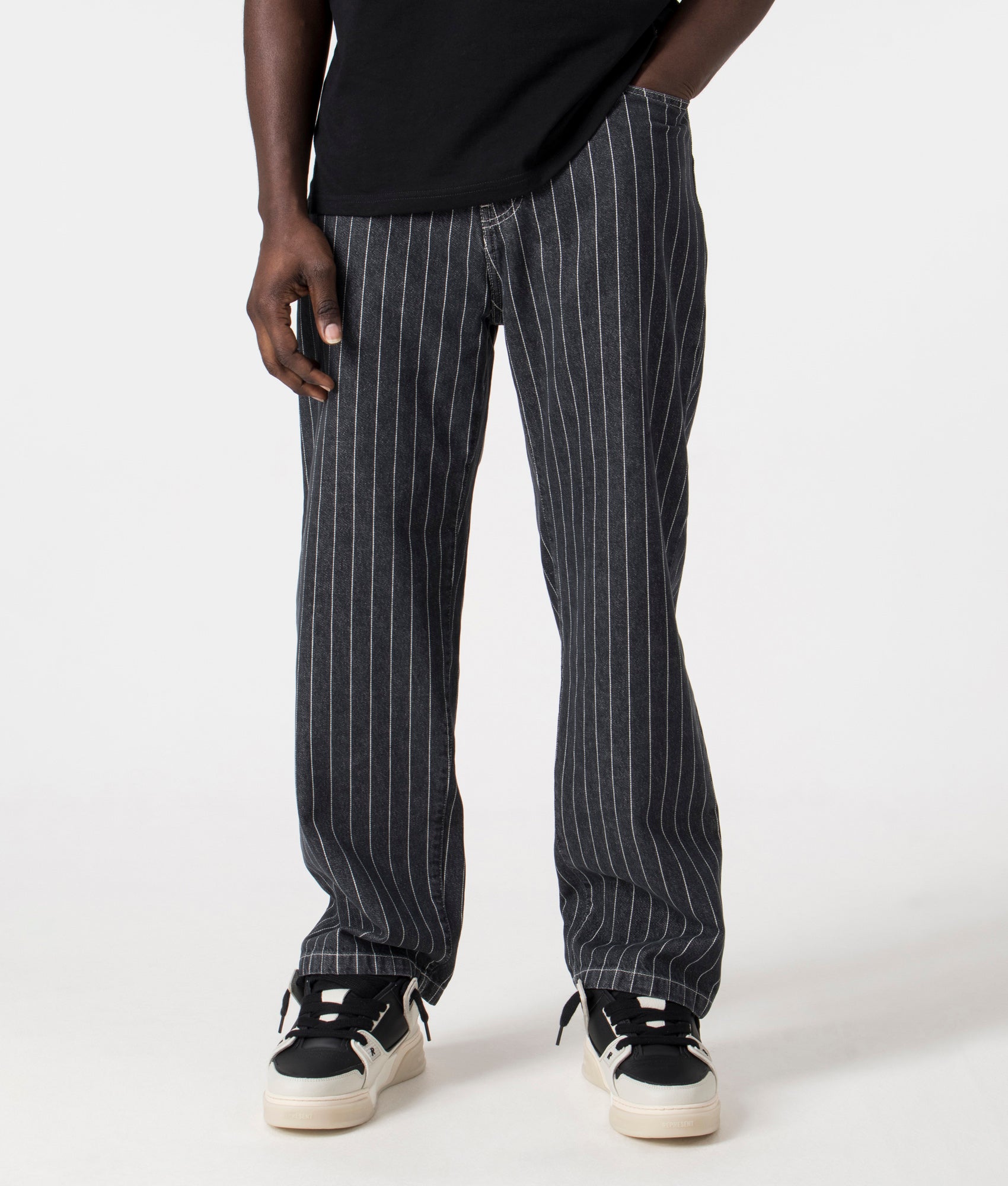 Carhartt WIP Orlean Pants in Orelan Stripe/Black/White. Front angle shot at EQVVS.