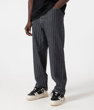 Carhartt WIP Orlean Pants in Orelan Stripe/Black/White. Front side angle shot at EQVVS.