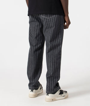 Carhartt WIP Orlean Pants in Orelan Stripe/Black/White. Back angle shot at EQVVS.