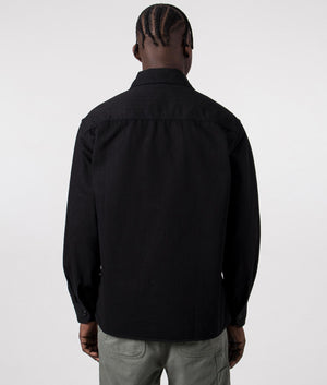 Carhartt WIP Rainer Overshirt in Black, 100% Cotton. Back Model Shot at EQVVS