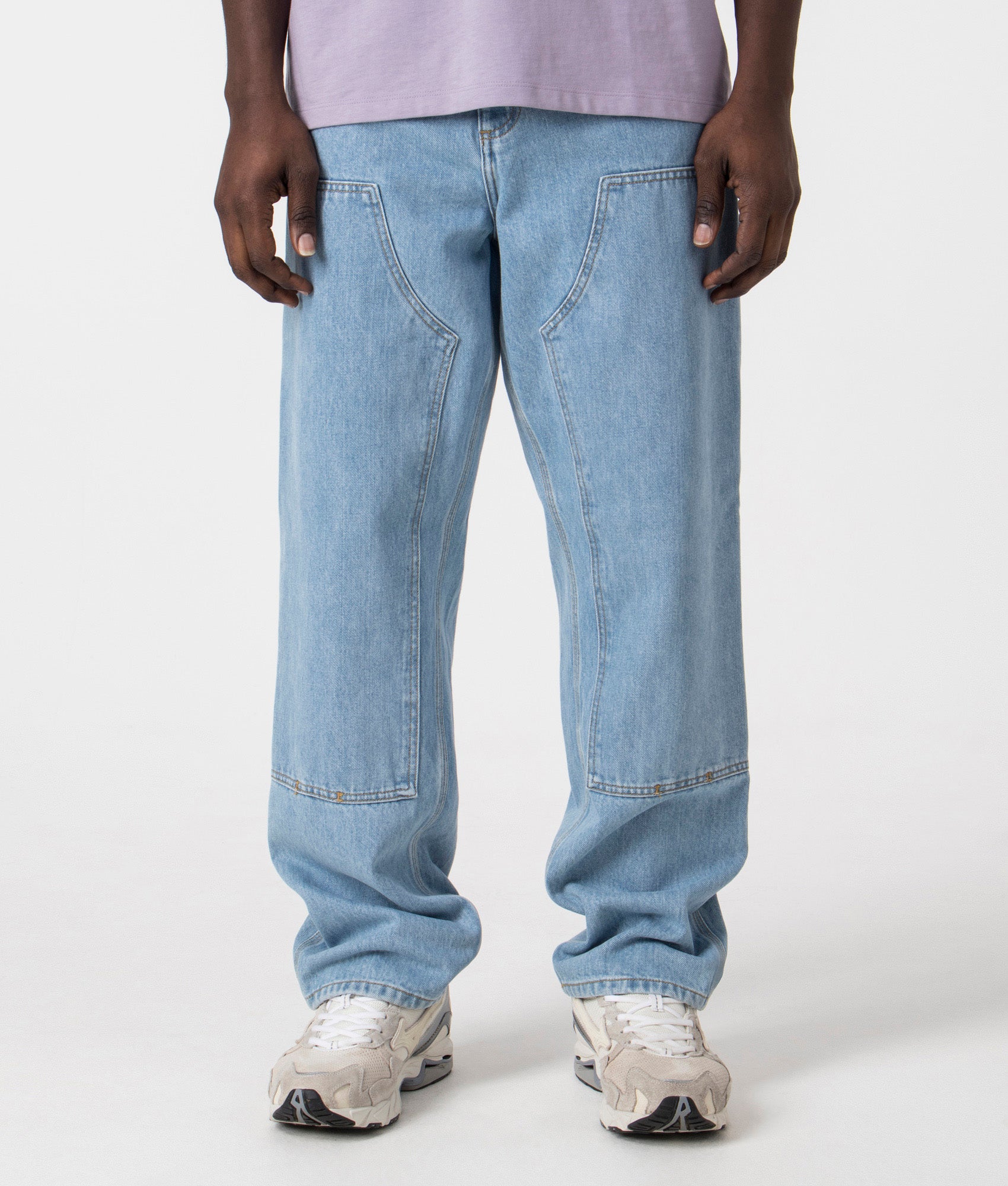 Relaxed Fit Double Knee Pants in Blue by Carhartt Wip. EQVVS Front Angle Shot.