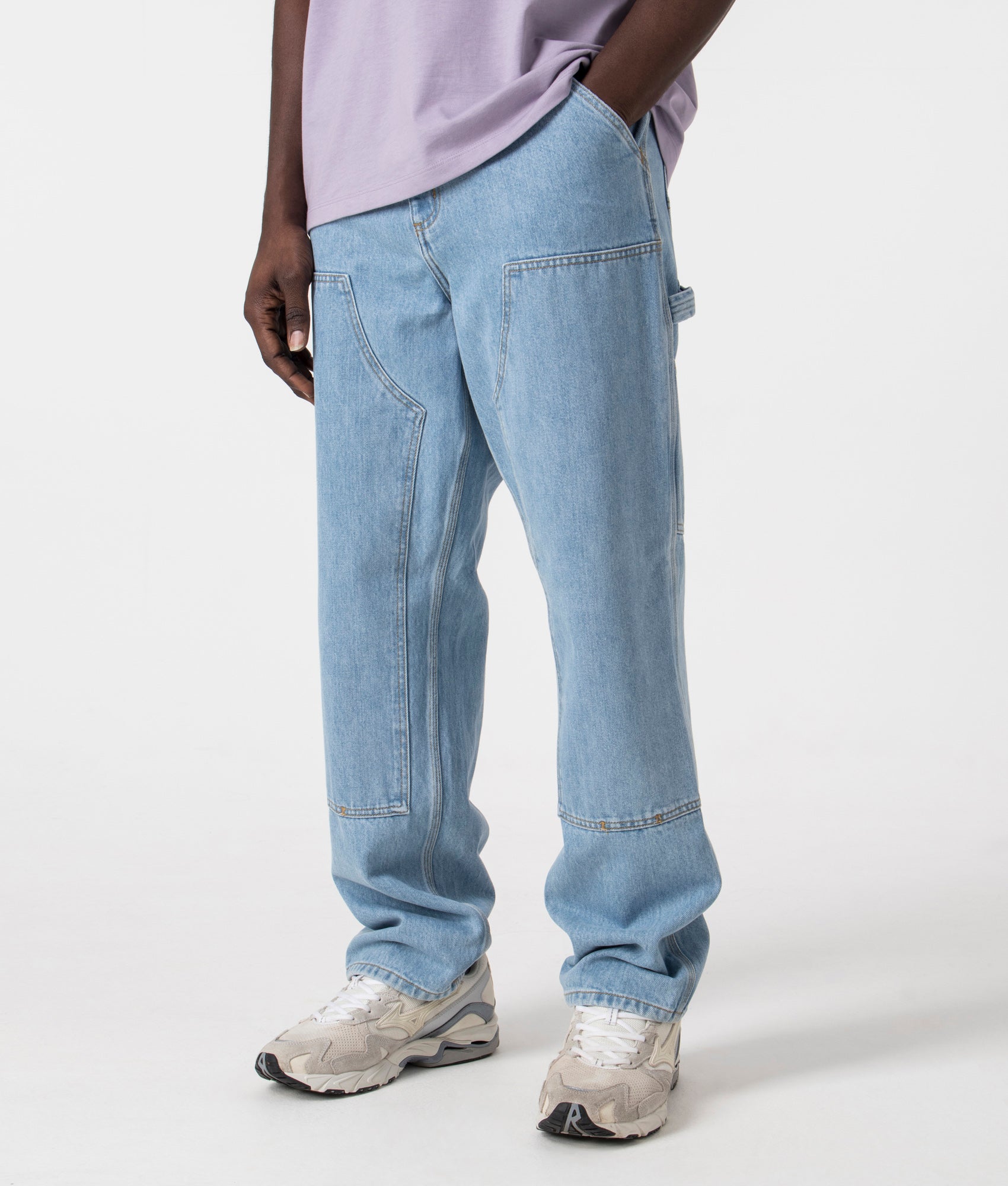Relaxed Fit Double Knee Pants in Blue by Carhartt Wip. EQVVS Side Angle Shot.