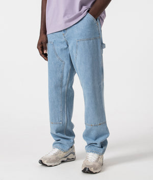 Relaxed Fit Double Knee Pants in Blue by Carhartt Wip. EQVVS Side Angle Shot.