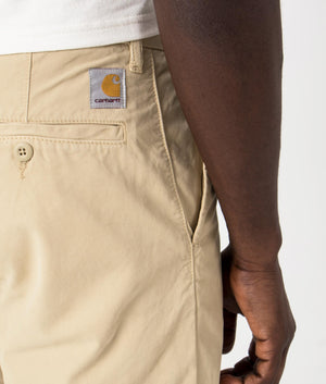 Carhartt WIP John Shorts in Sable Beige, 100% Cotton. Detail Shot at EQVVS.