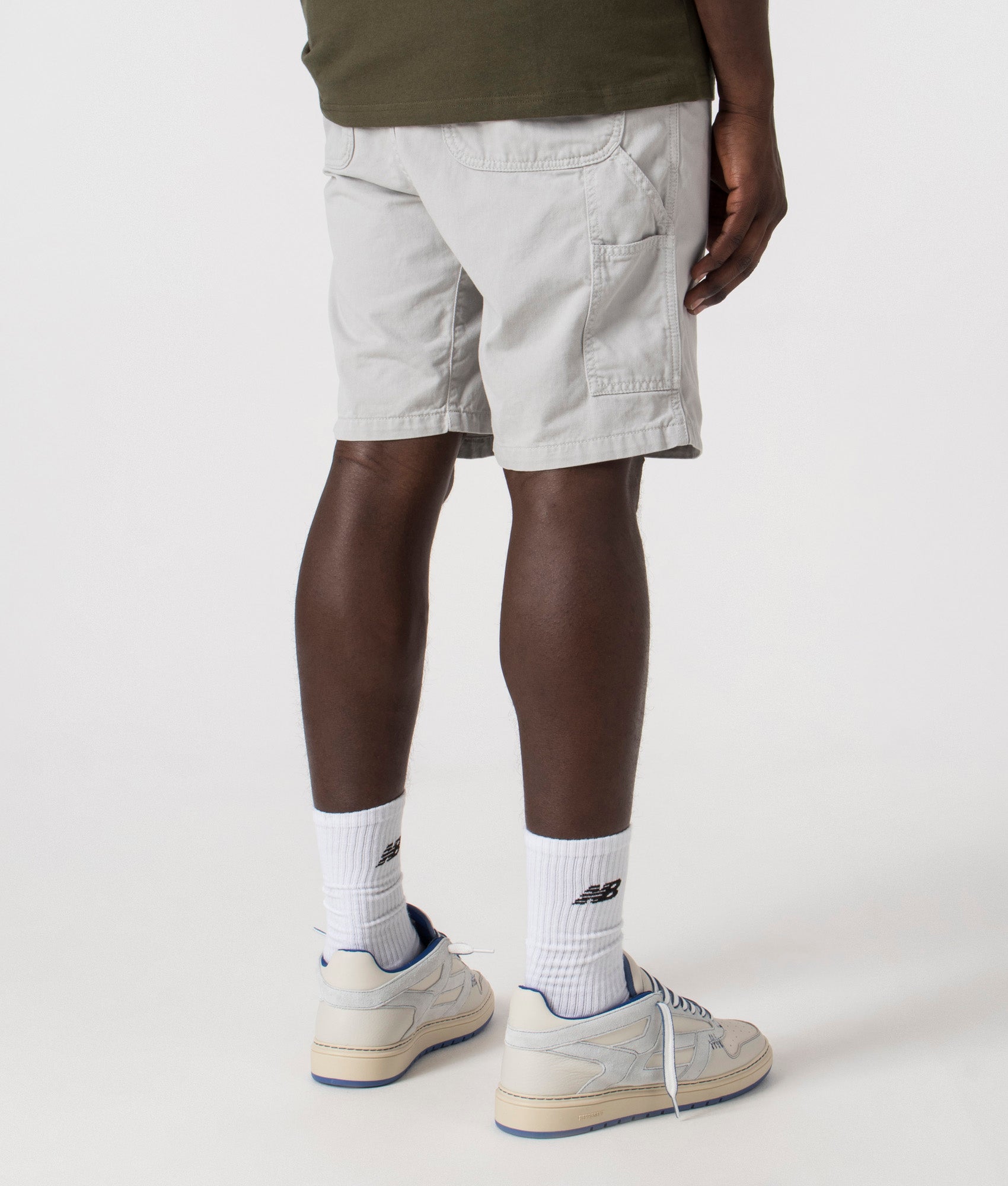 Flint Shorts in Sonic Silver by Carhartt. EQVVS Model Shot.