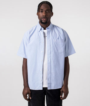 Carhartt Short Sleeve Braxton Shirt in Bleach Blue, 100% Cotton. Front Open Model Shot at EQVVS
