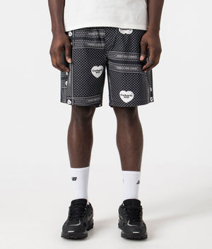 Carhartt WIP Heart Bandana Shorts in Heart Bandana Print Black. Front angle shot at EQVVS.