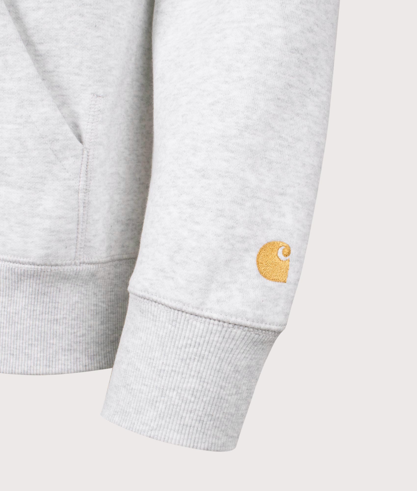 Carhartt WIP Chase Hoodie in Ash Heather/Gold at EQVVS Menswear. Detail shot.