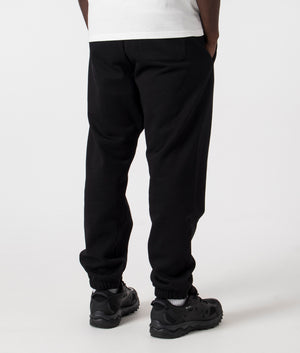 Chase Joggers in Black by Carhartt Wip. EQVVS Back Angle Shot.