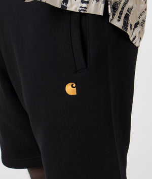Carhartt WIP Chase Sweat short in 00FXX Black/Gold detail shot at EQVVS