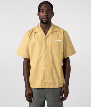 Carhartt WIP Short Sleeve Link Script Shirt in Bourbon Yellow and White, 100% Cotton. Front Model Shot at EQVVS