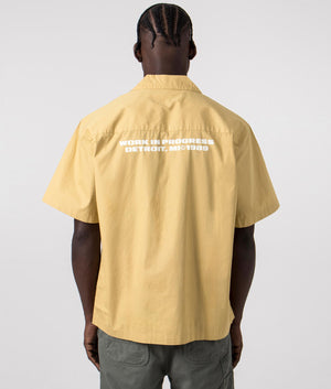 Carhartt WIP Short Sleeve Link Script Shirt in Bourbon Yellow and White, 100% Cotton. back Model Shot at EQVVS