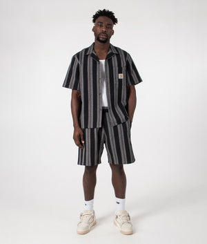 Carhartt WIP Short Sleeve Dodson Shirt in Stripe Black. Front angle model shot at EQVVS.