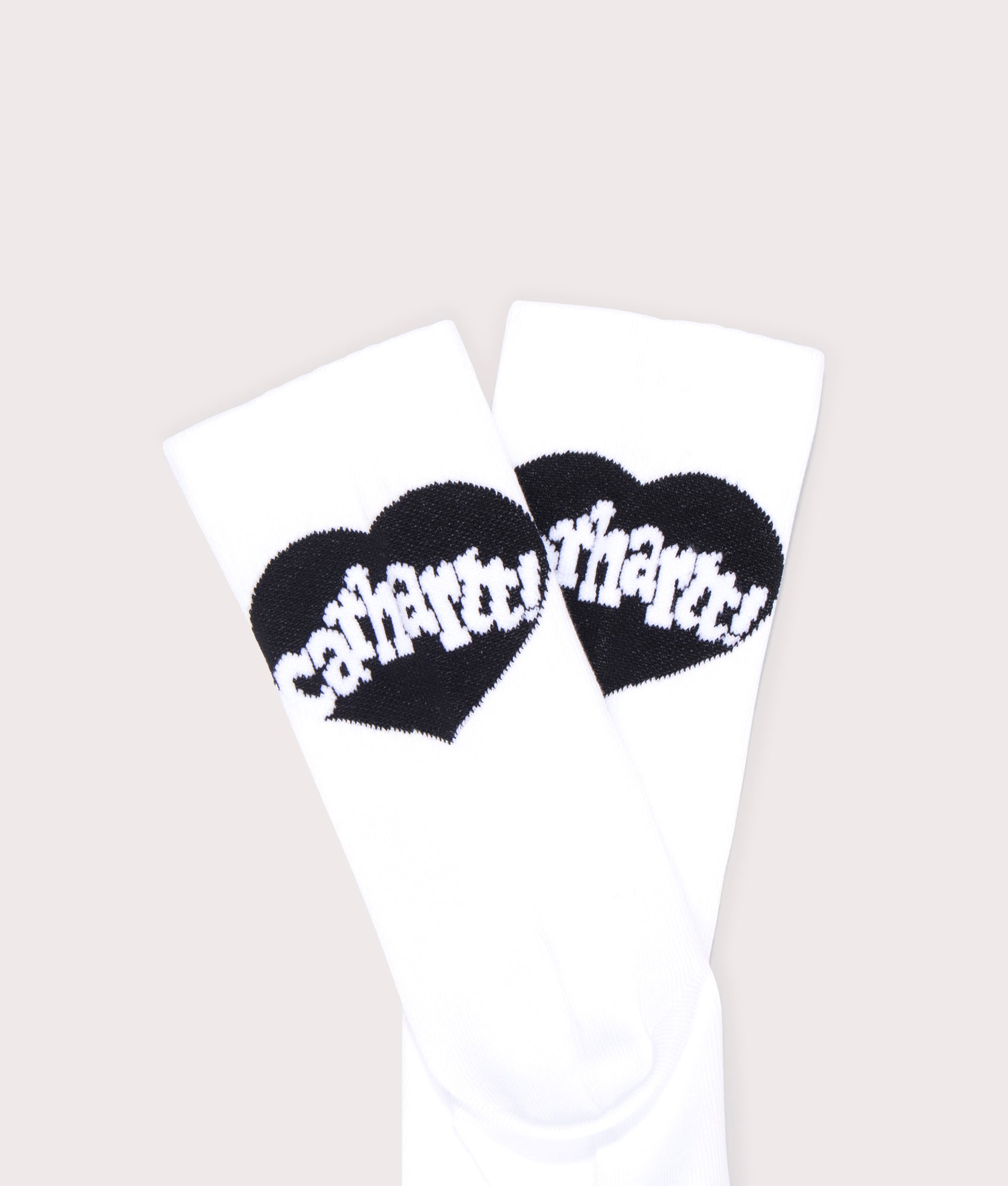 Carhartt WIP Amour Socks in White. Detail flat angle shot at EQVVS.