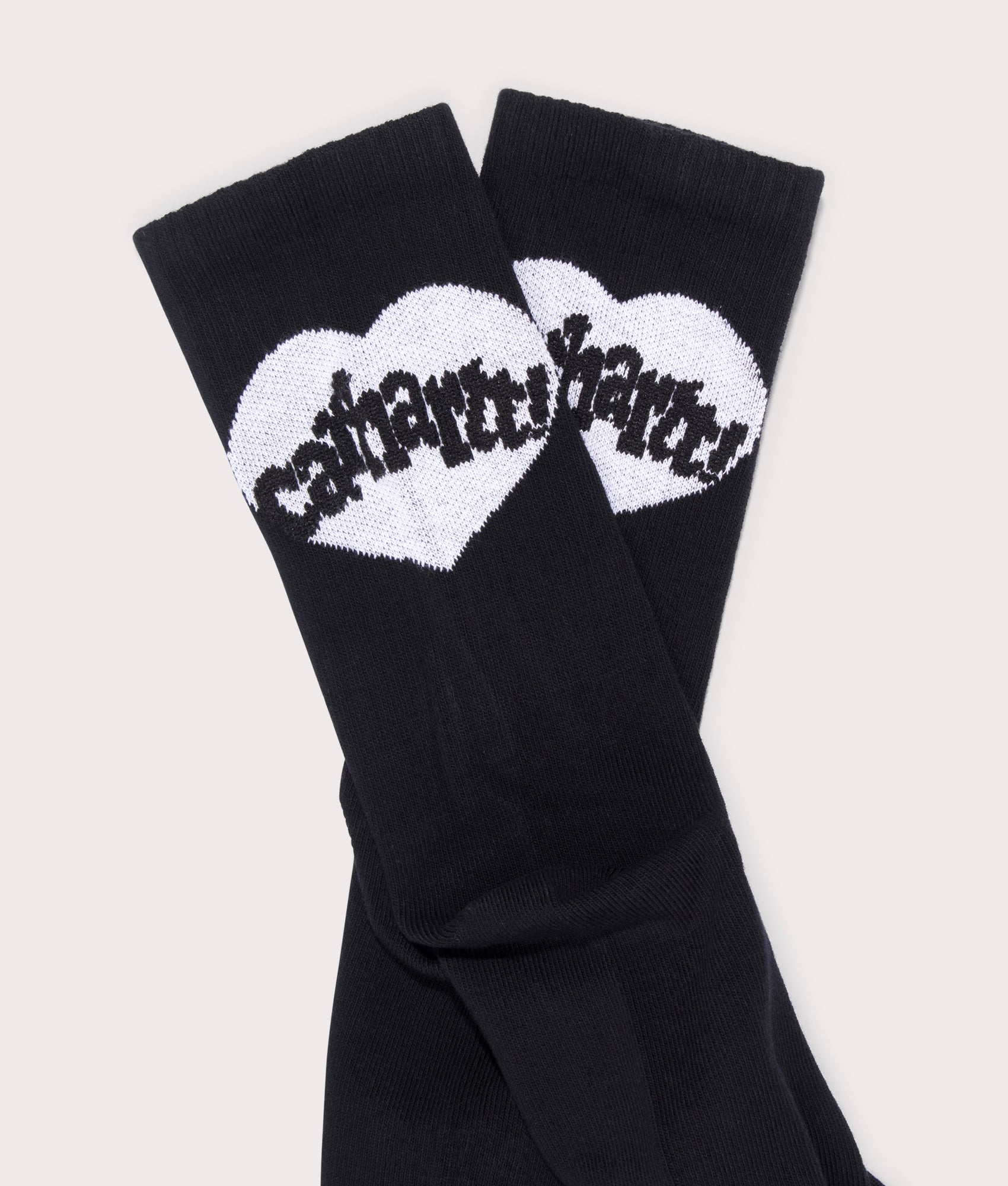 Carhartt WIP Amour Socks in Black. detail flat angle shot at EQVVS.