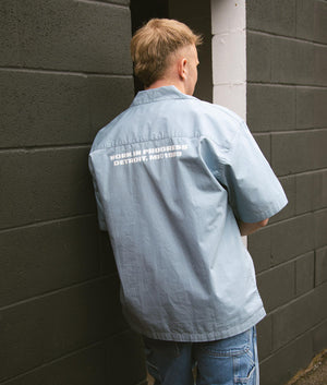 Carhartt WIP Short Sleeve Link Script Shirt in Frosted Blue and White, 100% Cotton. Campaign Shot at EQVVS