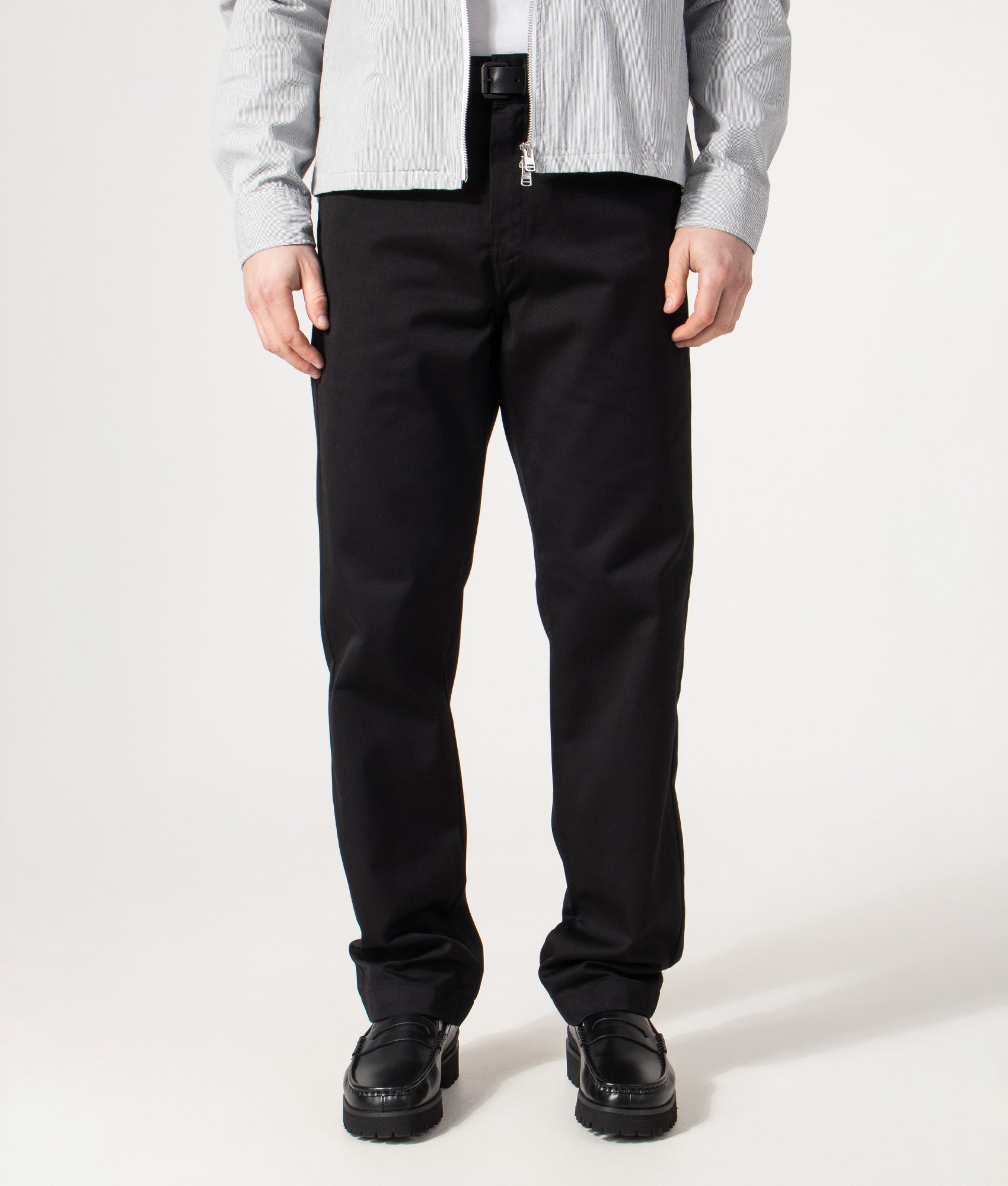 Carhartt WIP Relaxed Fit Tapered Master Pants in Black at EQVVS Menswear. Front shot.