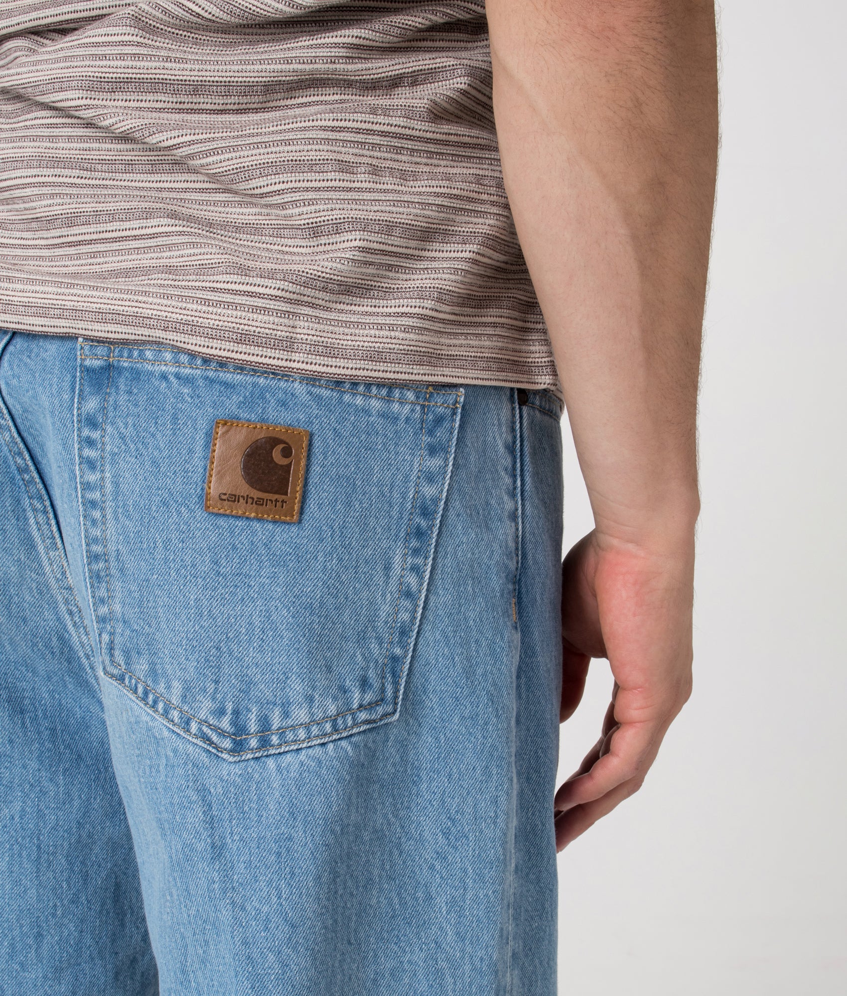 Relaxed Fit Aaron Pants in Blue. 100% Cotton  | Carhartt WIP | Shot at EQVVS | Back detail shot 