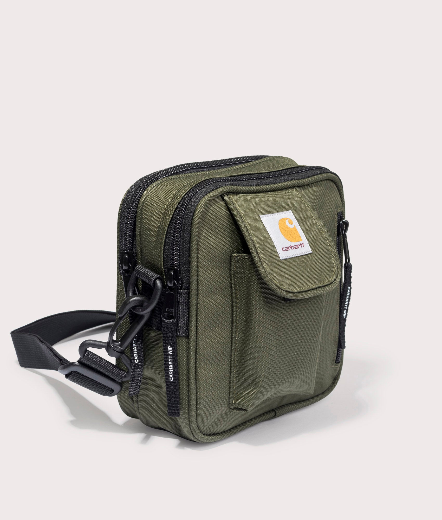 Carhartt WIP Small Essentials Bag in Office Green at EQVVS Angle Shot