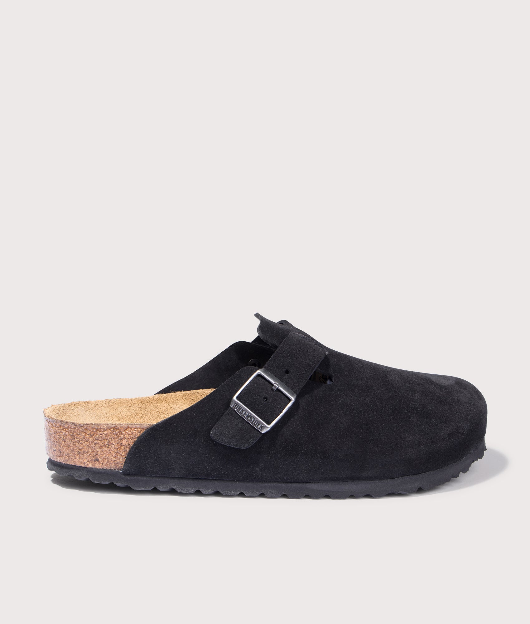 BIRKENSTOCK Boston Suede Leather Clogs in Black. Shot at EQVVS. Side shot 