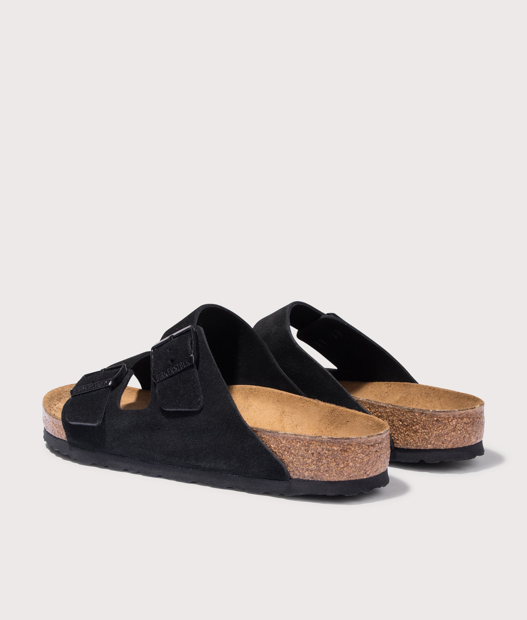 BIRKENSTOCK Arizona Suede Leather Sandals in Black. Shot at EQVVS. Back angle shot 