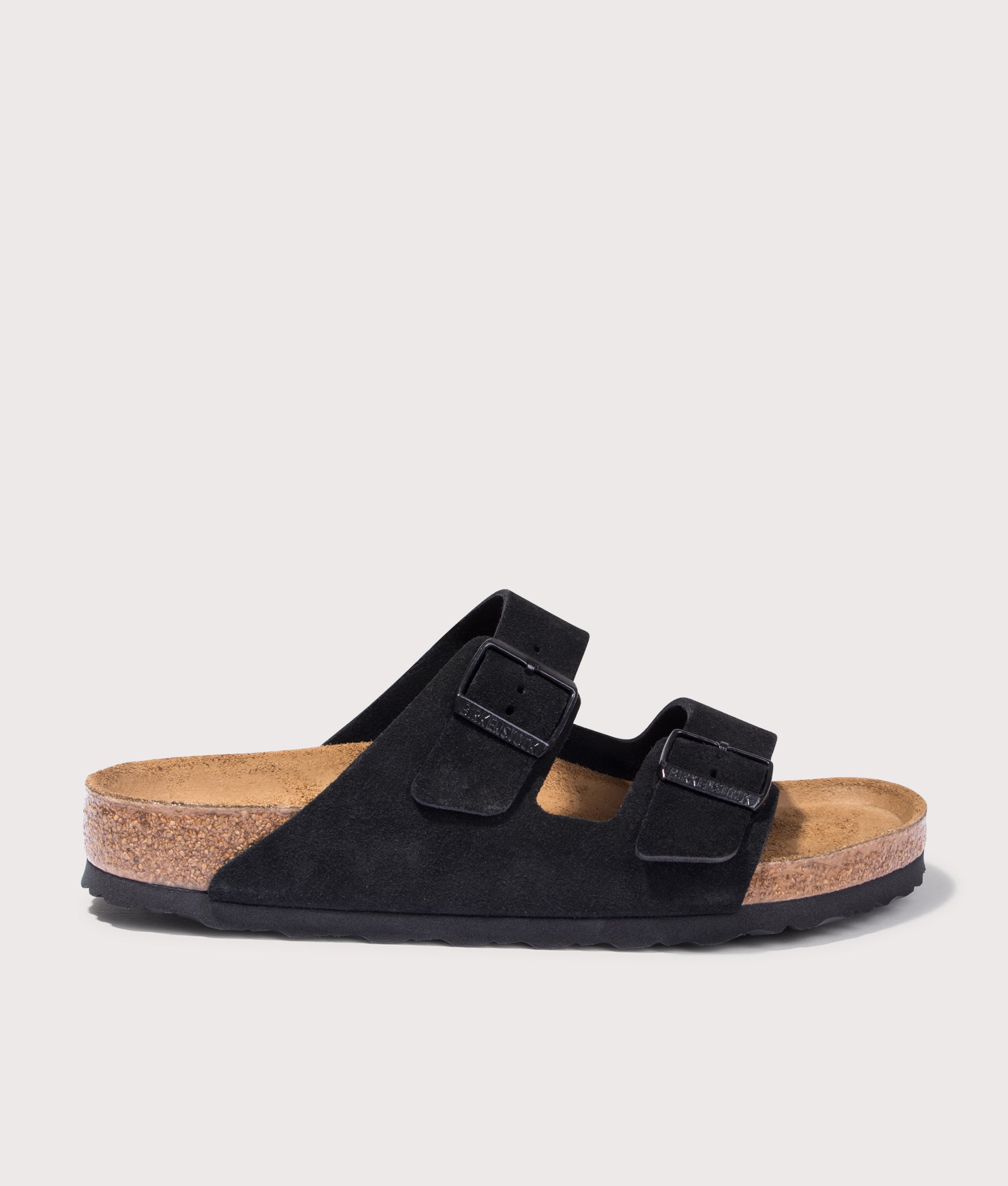 BIRKENSTOCK Arizona Suede Leather Sandals in Black. Shot at EQVVS. Side shot 