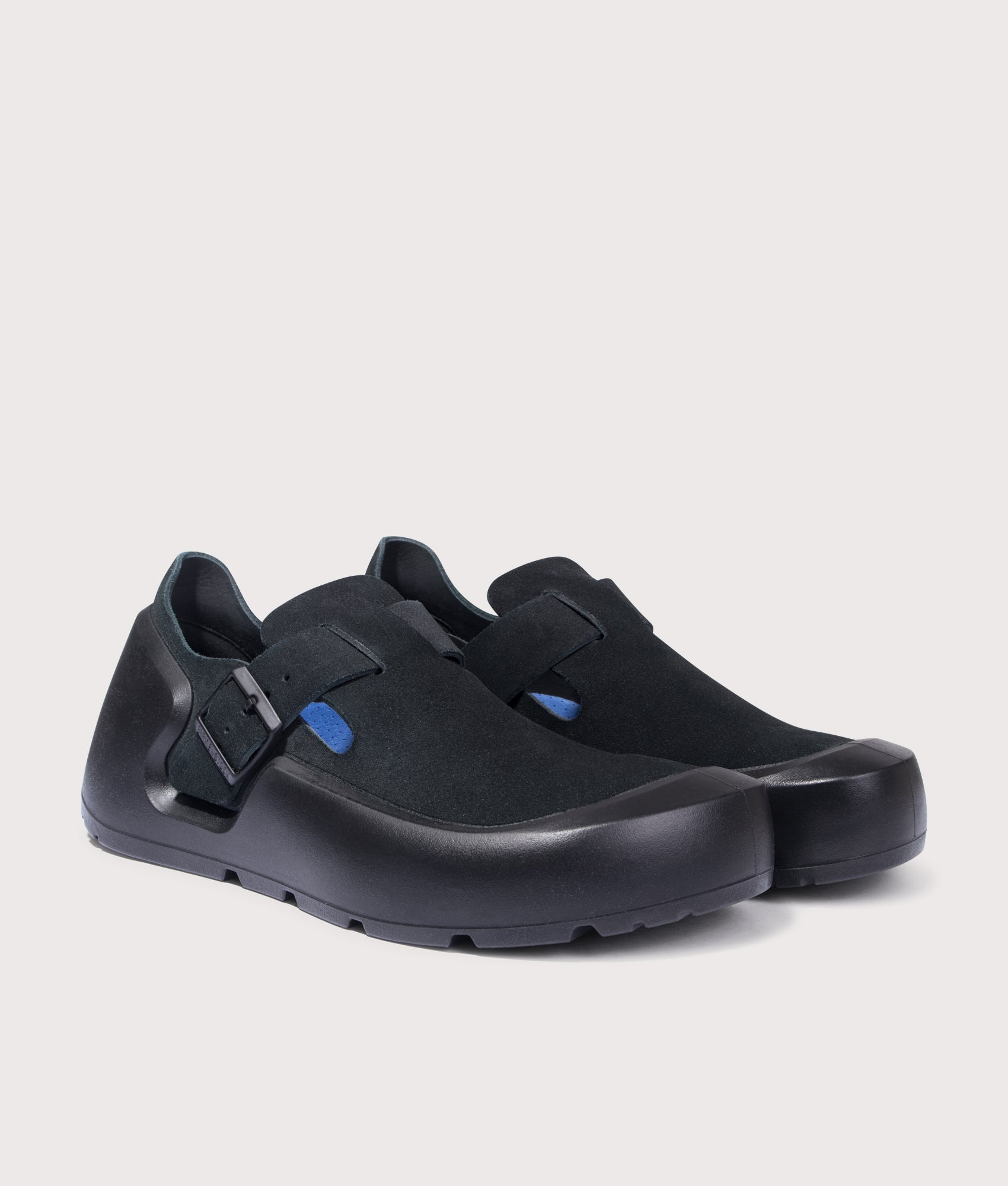 BIRKENSTOCK Reykjavik Nubuk Leather Shoes in Black. Shot at EQVVS. Front angle shot 