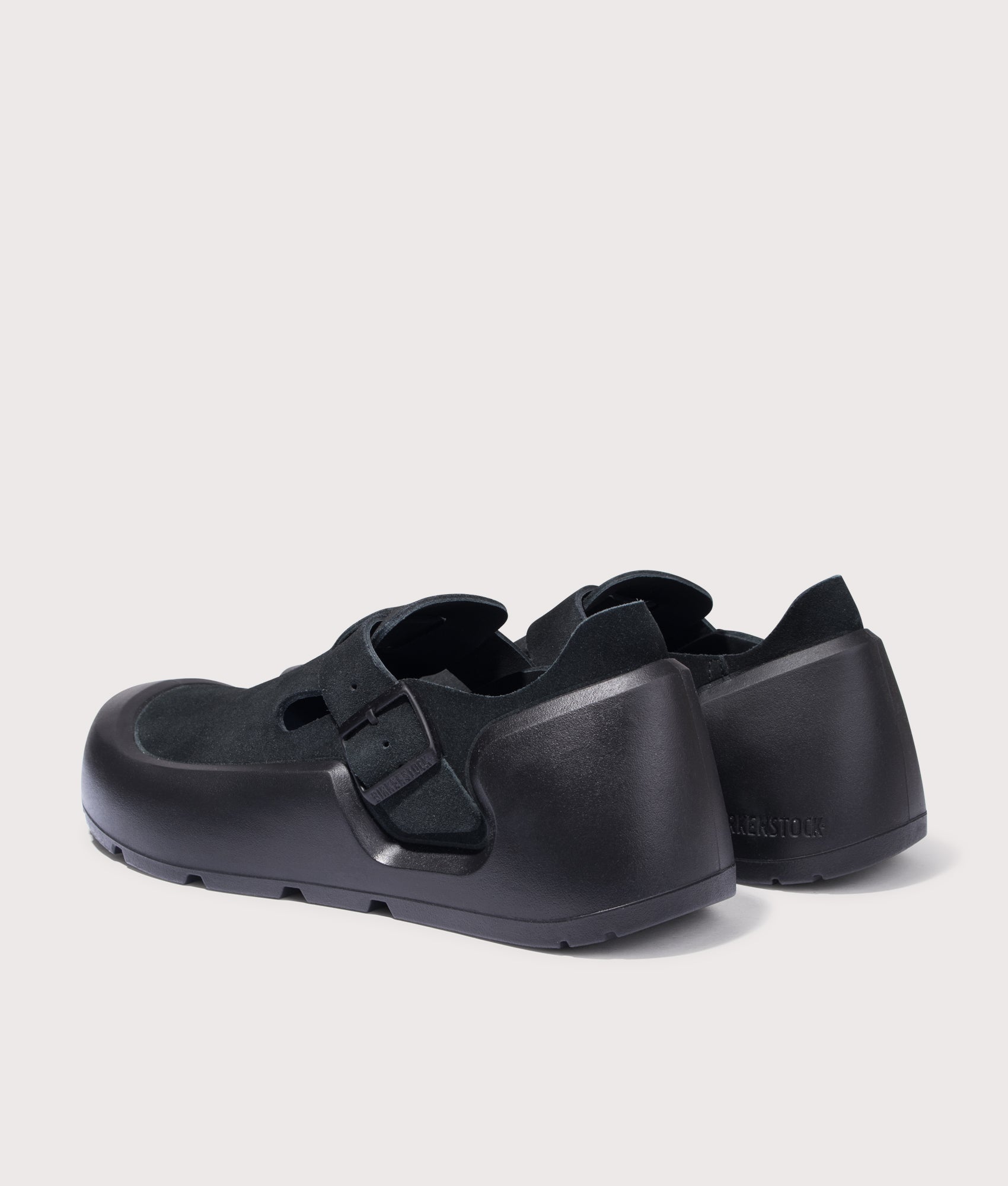 BIRKENSTOCK Reykjavik Nubuk Leather Shoes in Black. Shot at EQVVS. Back angle shot 