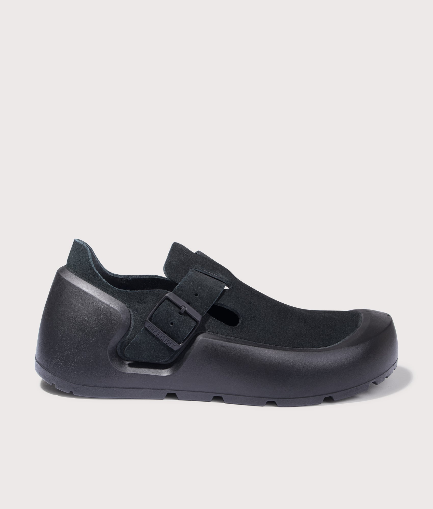 BIRKENSTOCK Reykjavik Nubuk Leather Shoes in Black. Shot at EQVVS. Side shot 