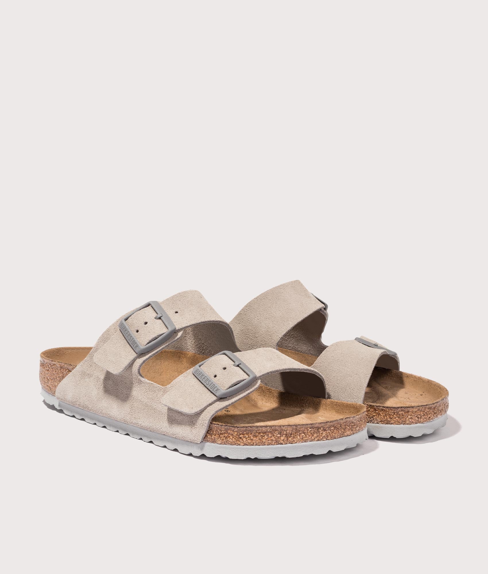 BIRKENSTOCK Arizona Suede Leather Sandals in Stone Coin. Shot at EQVVS.  Front angle shot 