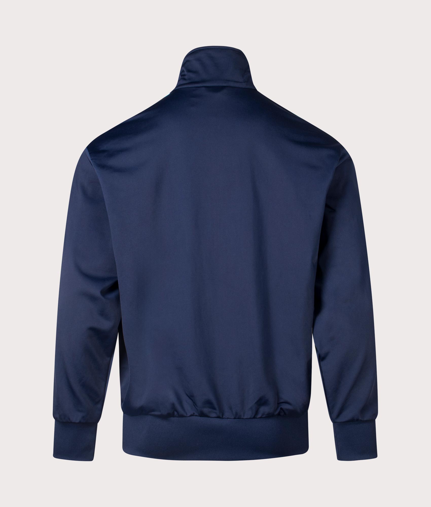 The adidas Originals Firebird Track Top in night indigo. Back shot at EQVVS.